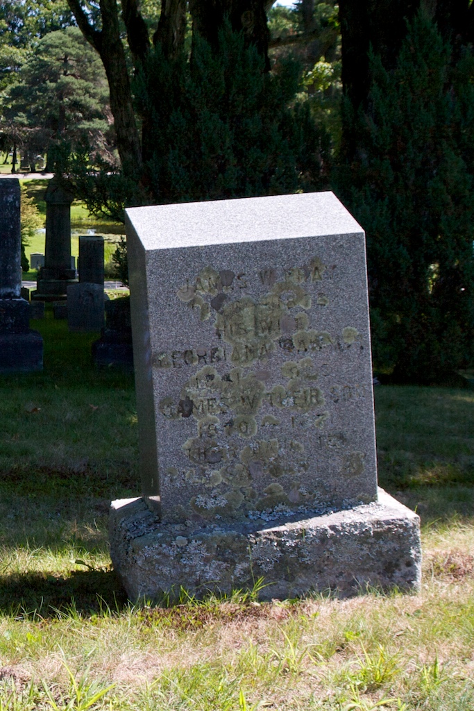 Headstone for James W. Pray, son James, wife Georgianna, and daughter Lily